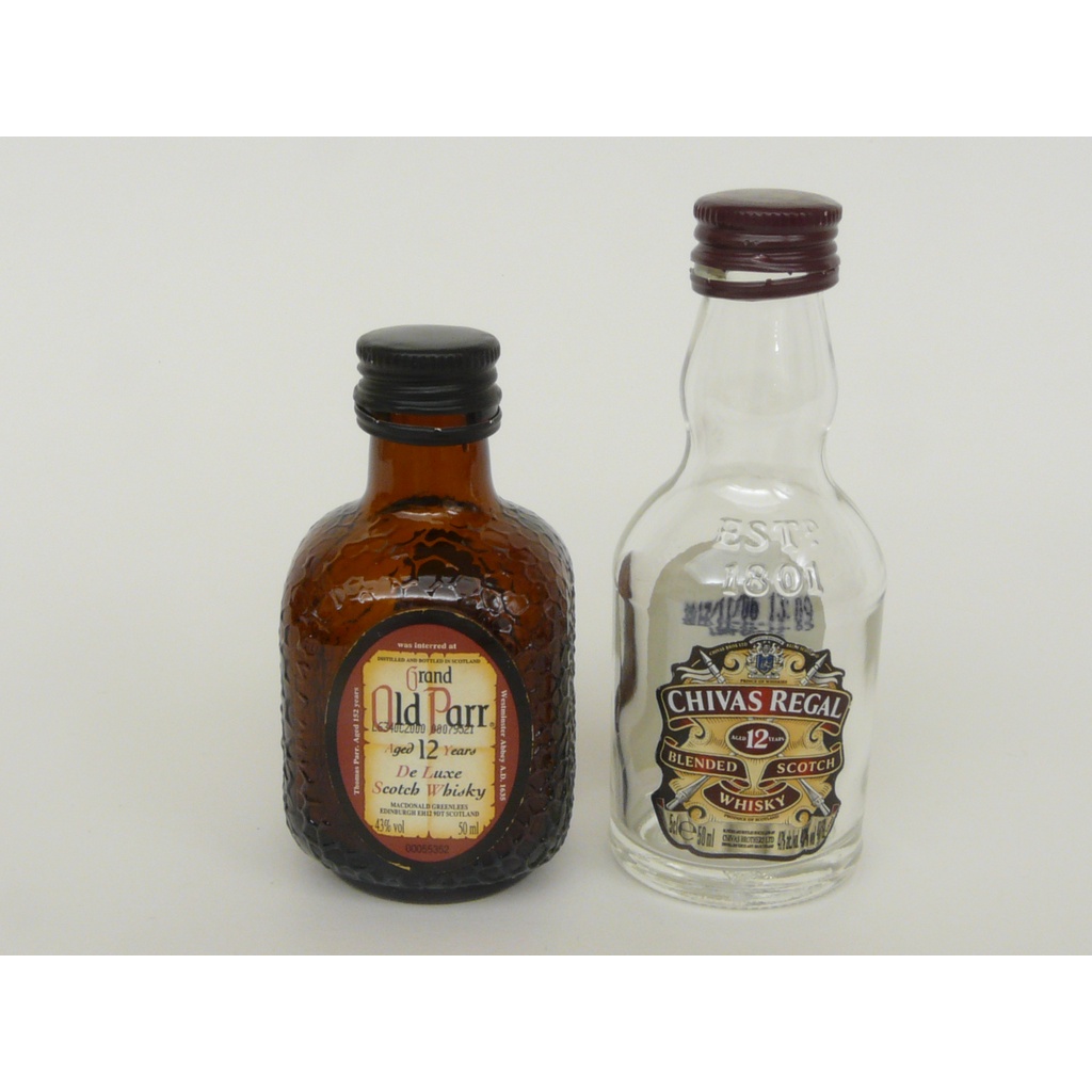 empty-miniature-whiskey-bottles-chibas-regal-12-years-and-old-parr-12