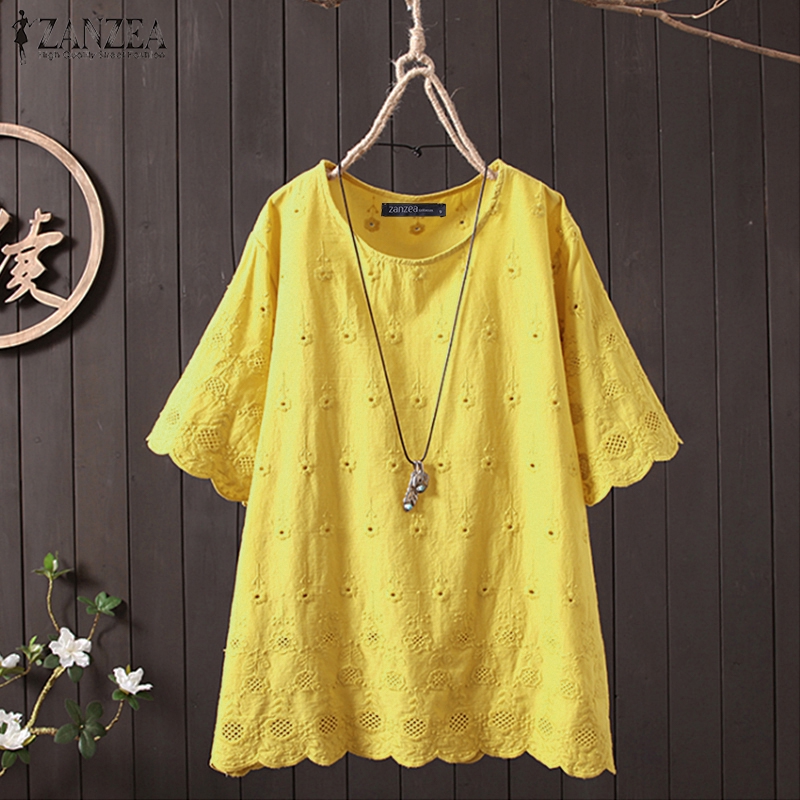 yellow eyelet top