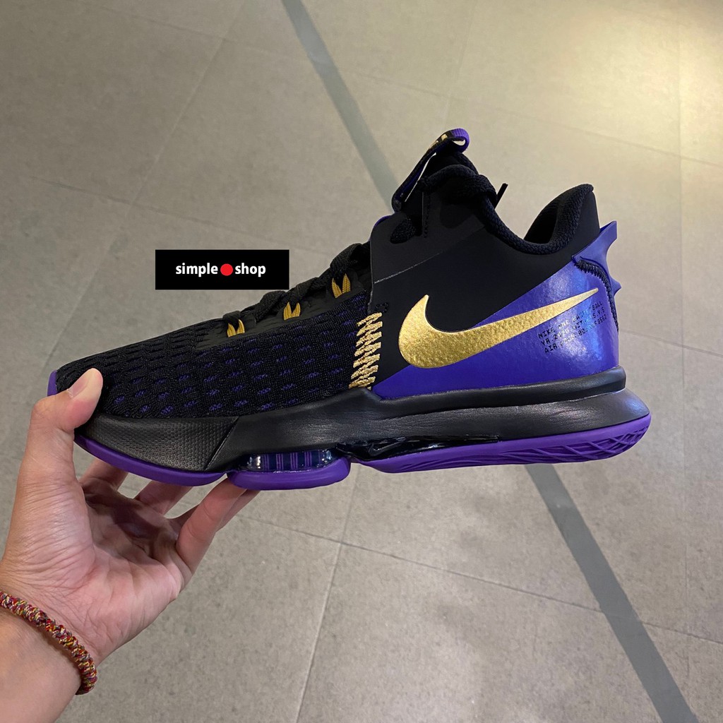 black and purple basketball shoes