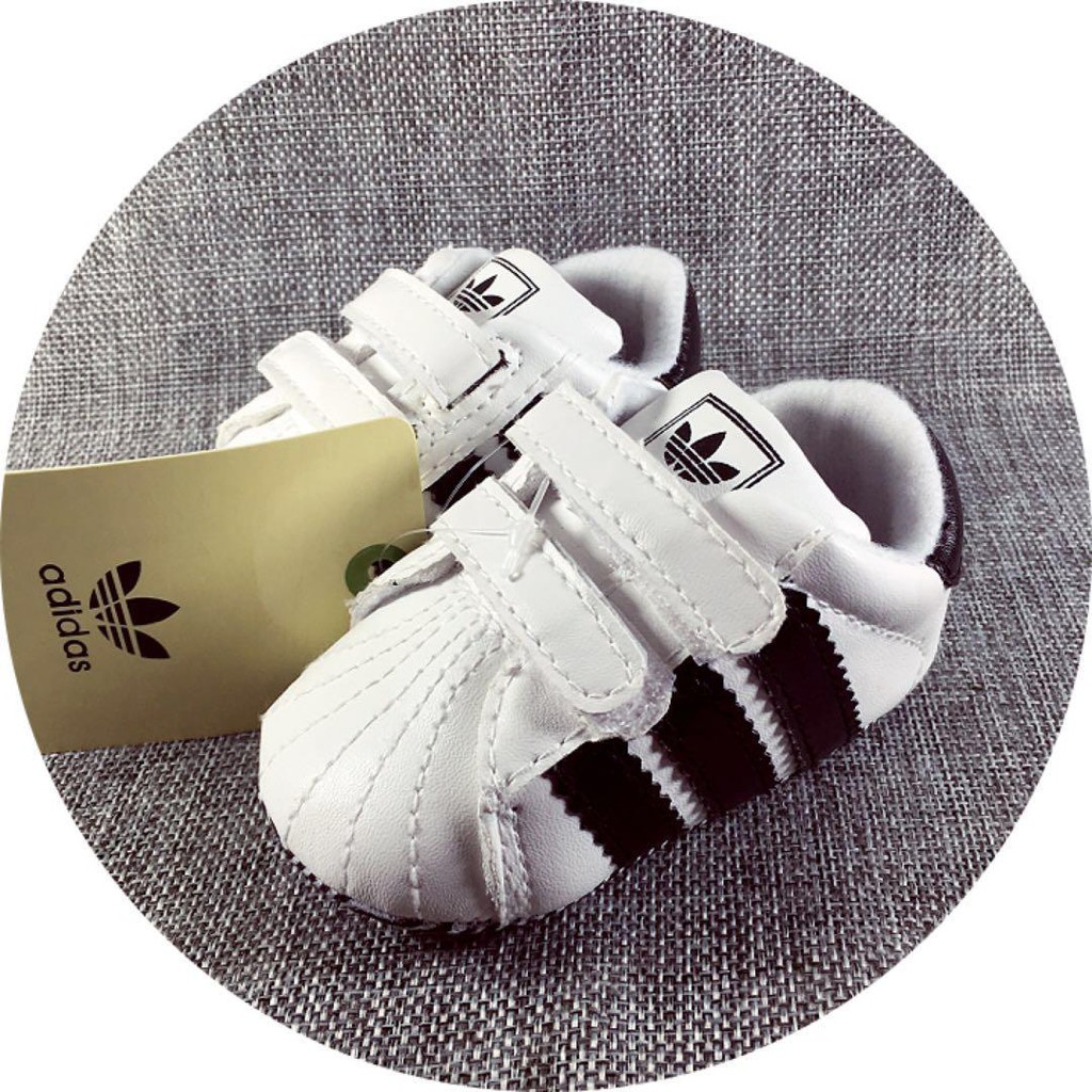 white adidas baby shoes