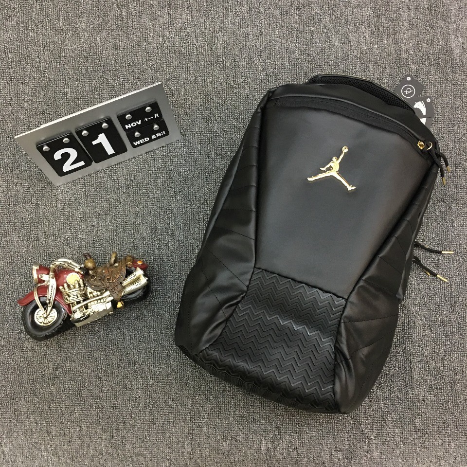 jordan retro 12 backpack black and gold