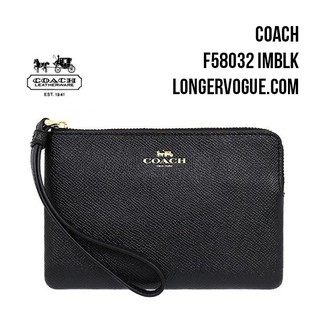 coach wristlet white