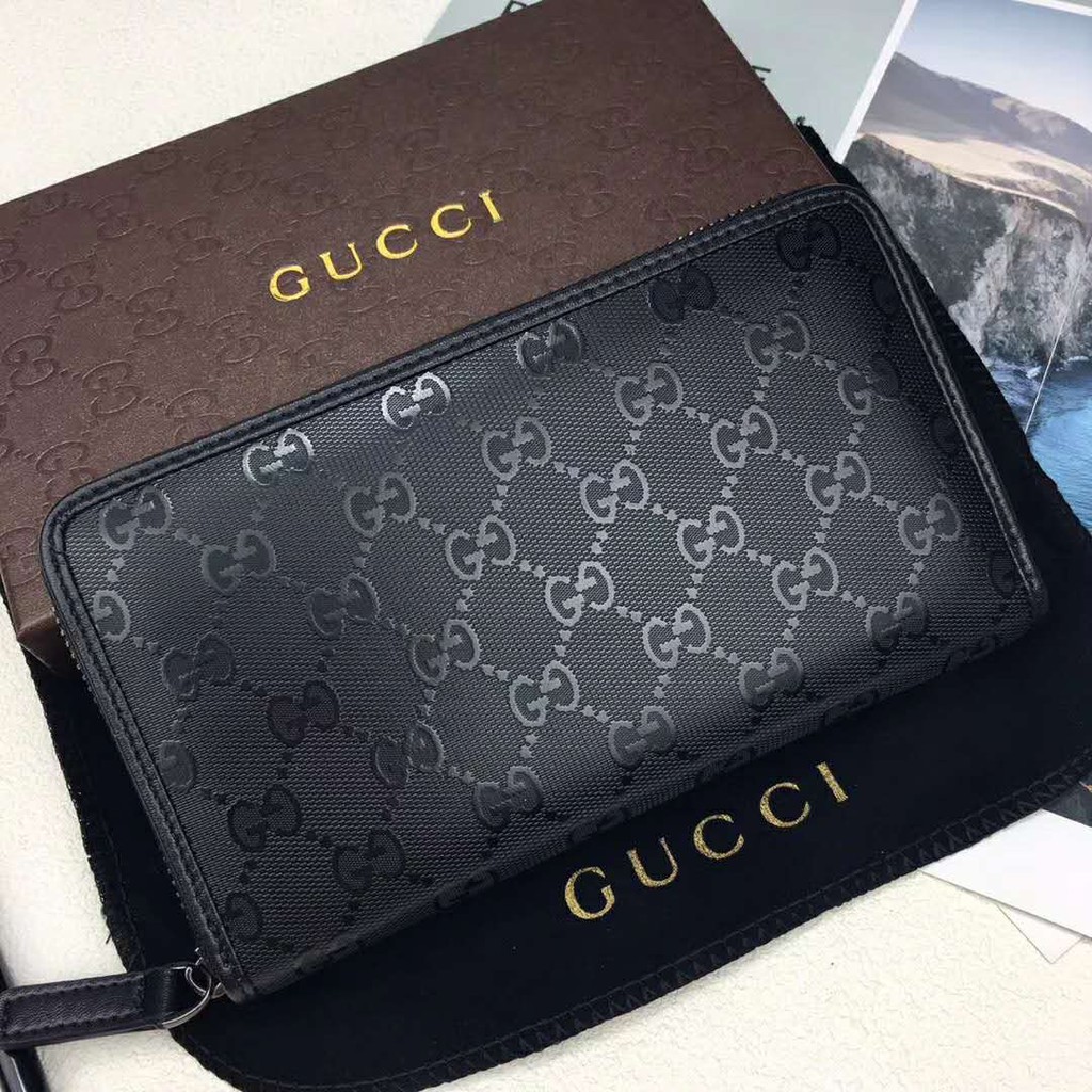 gucci wallet embossed