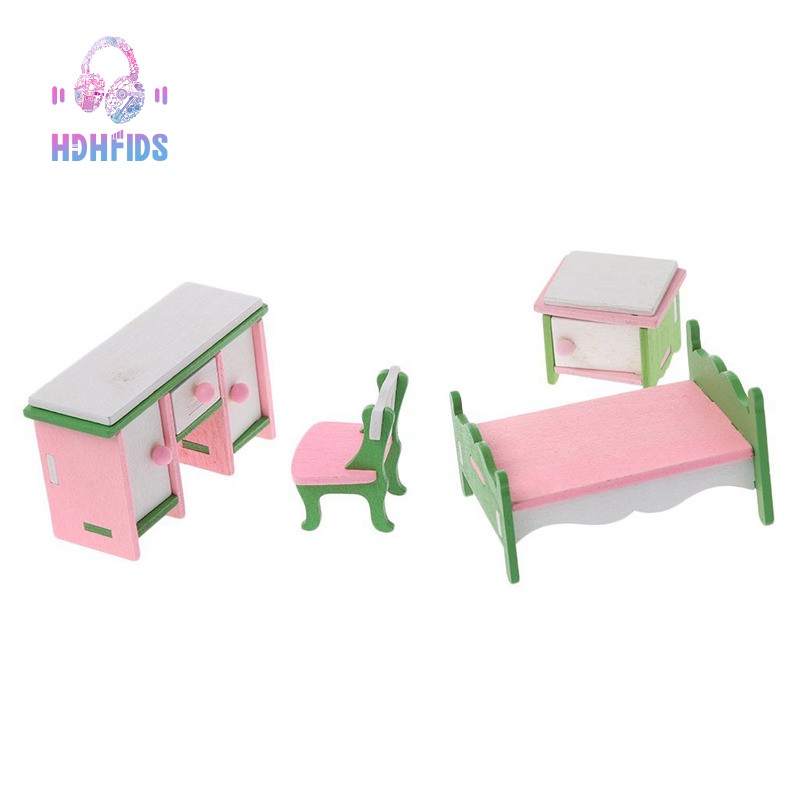 dollhouse with furniture and dolls