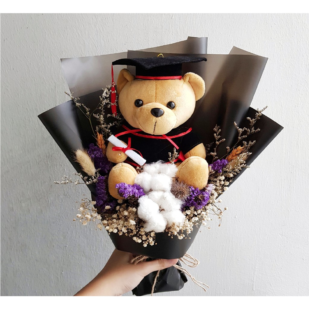 graduation flowers with bear