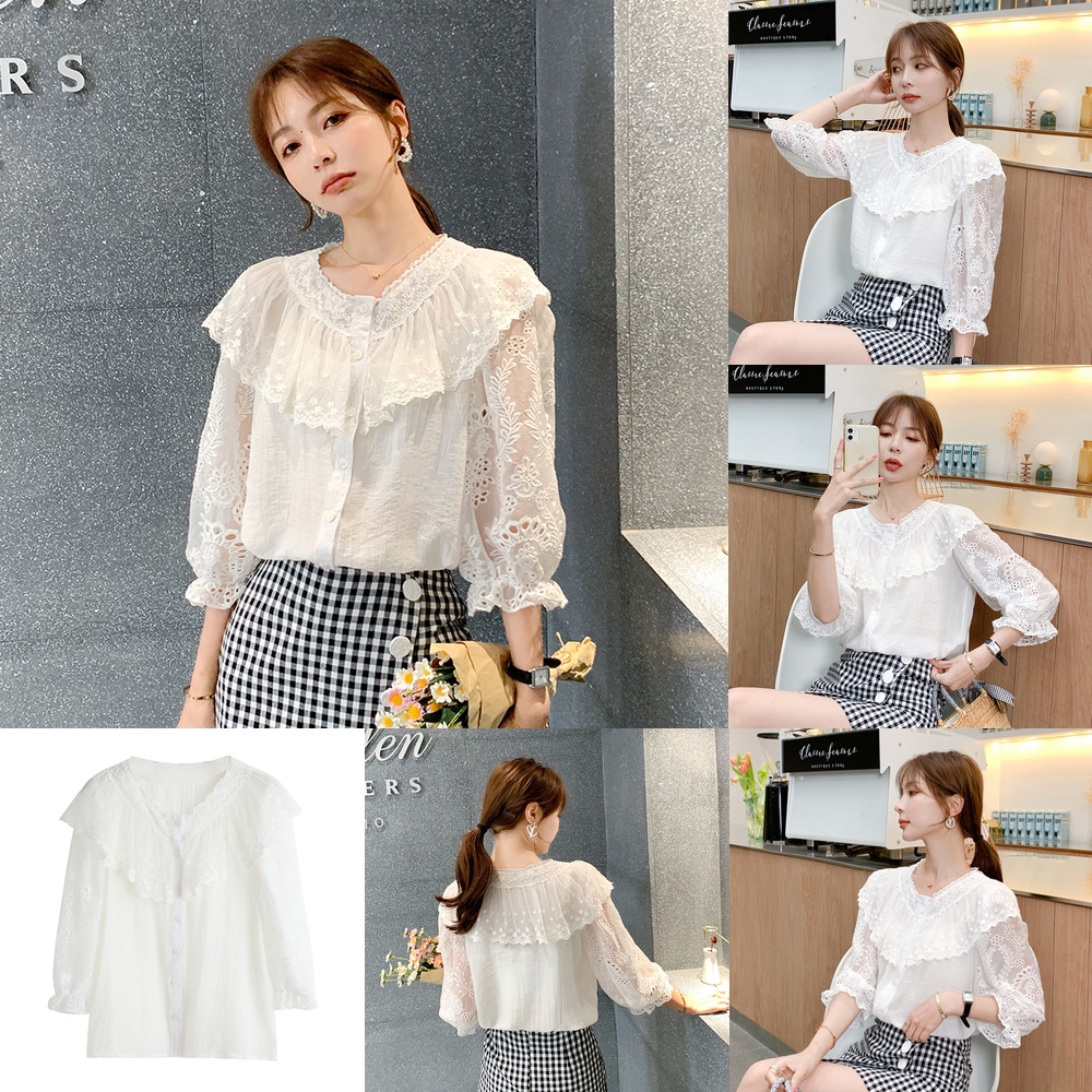 womens white shirt with ruffles