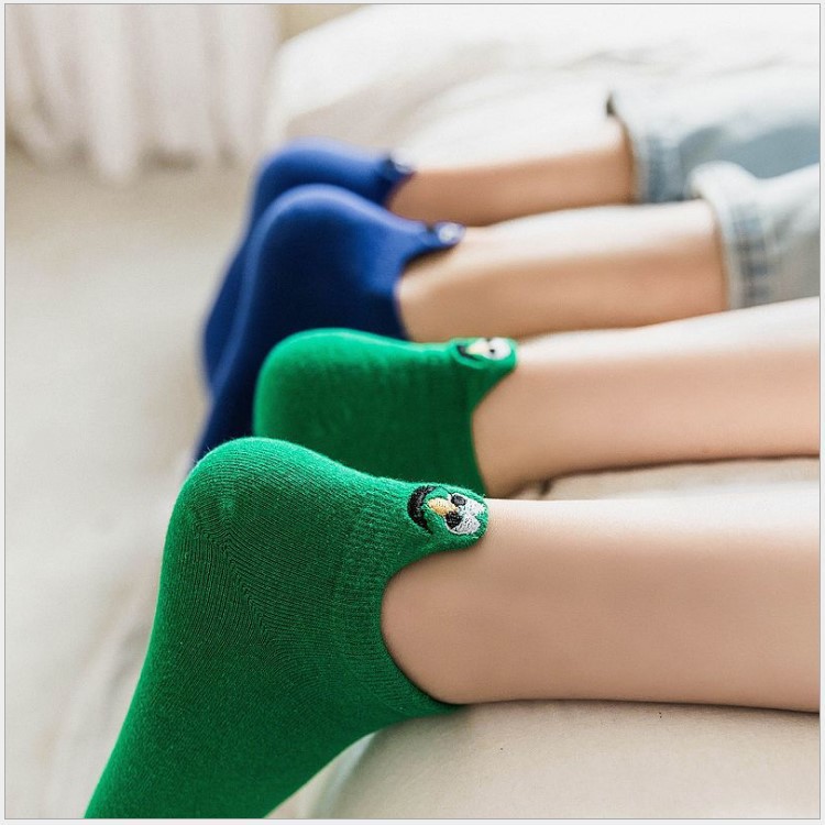 trainer socks with faces on the back