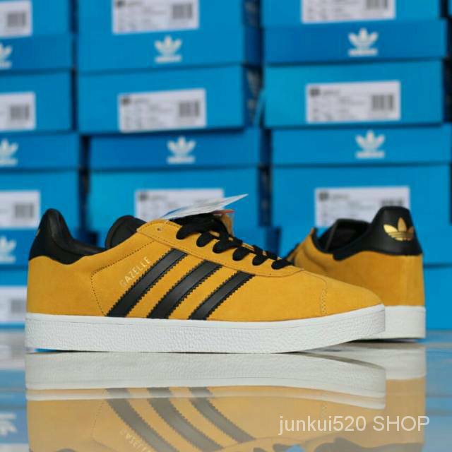 yellow and black adidas trainers