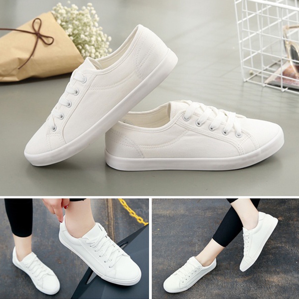 ladies white canvas plimsolls