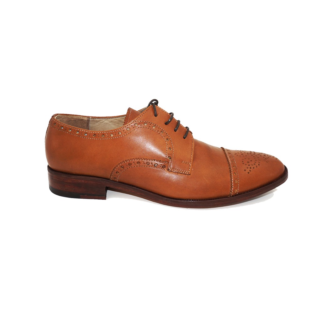 light tan wingtip shoes