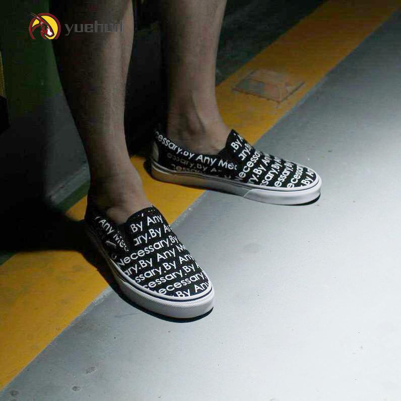 vans x supreme slip on