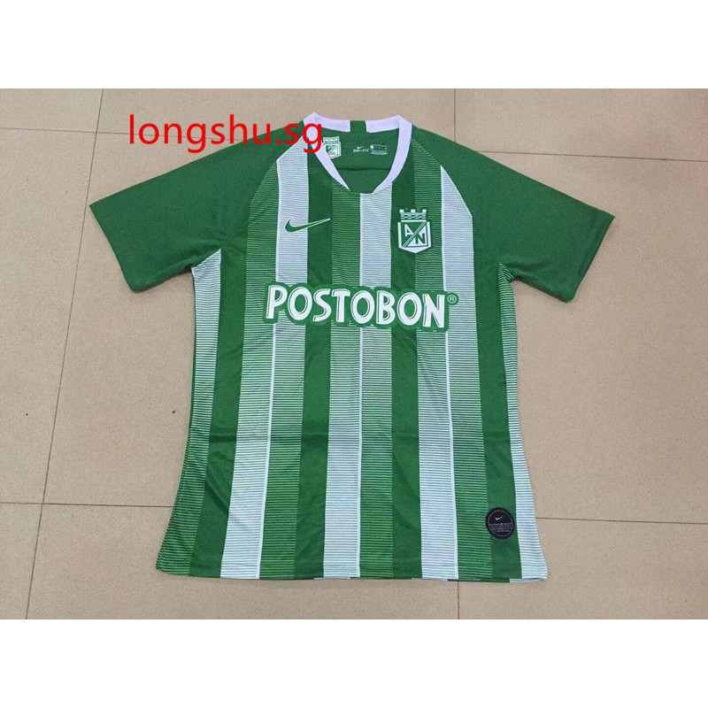 green and white soccer jersey