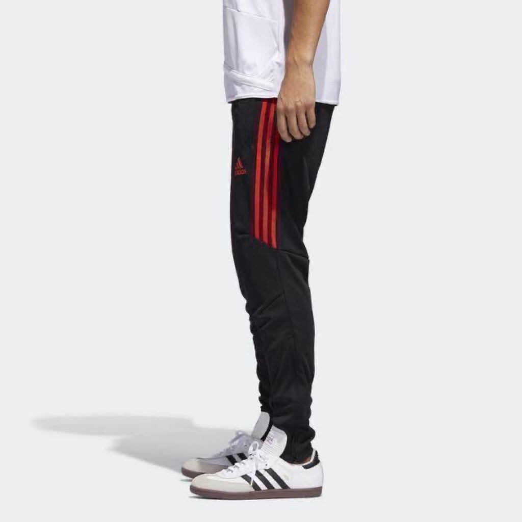 adidas red track pants with black stripes