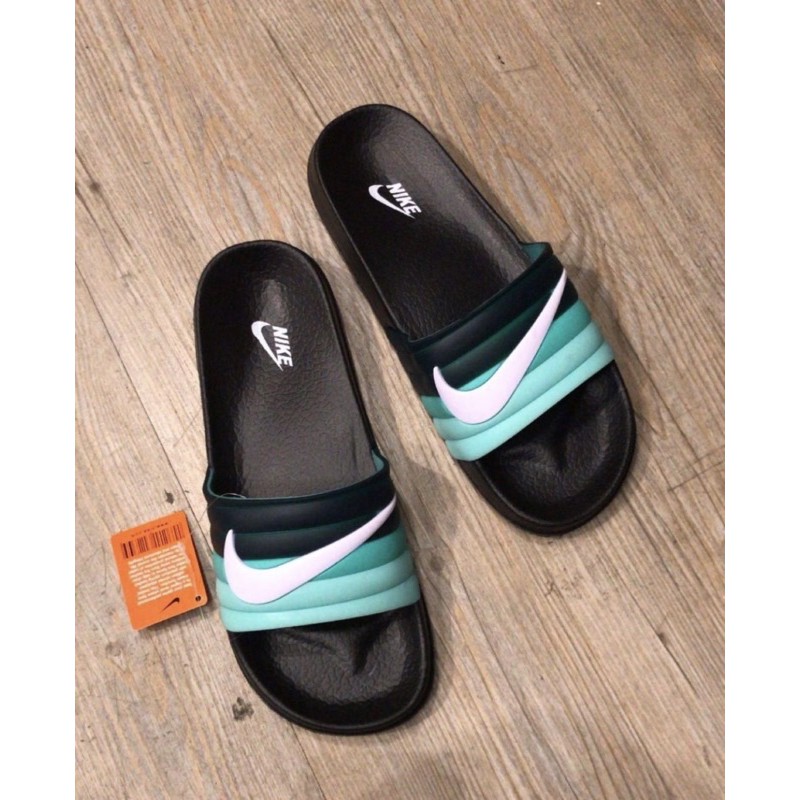 turquoise nike slides