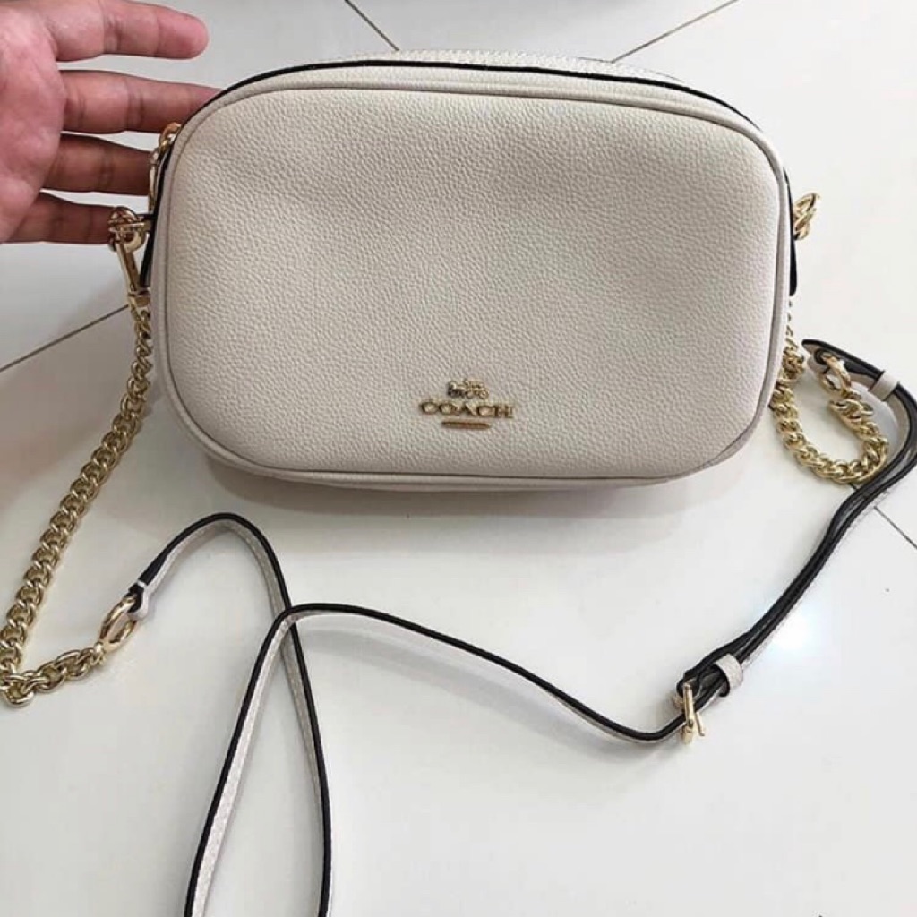 coach sling bag white