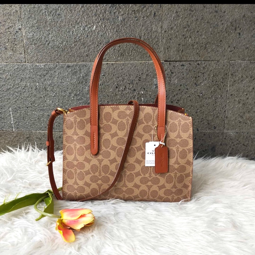 coach charlie carryall in signature canvas