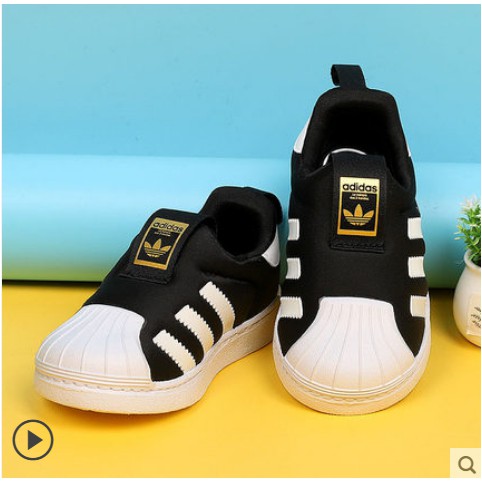kids black and gold shoes