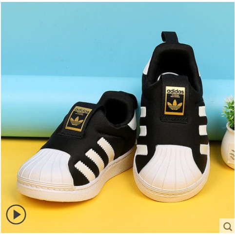 kids black and gold shoes