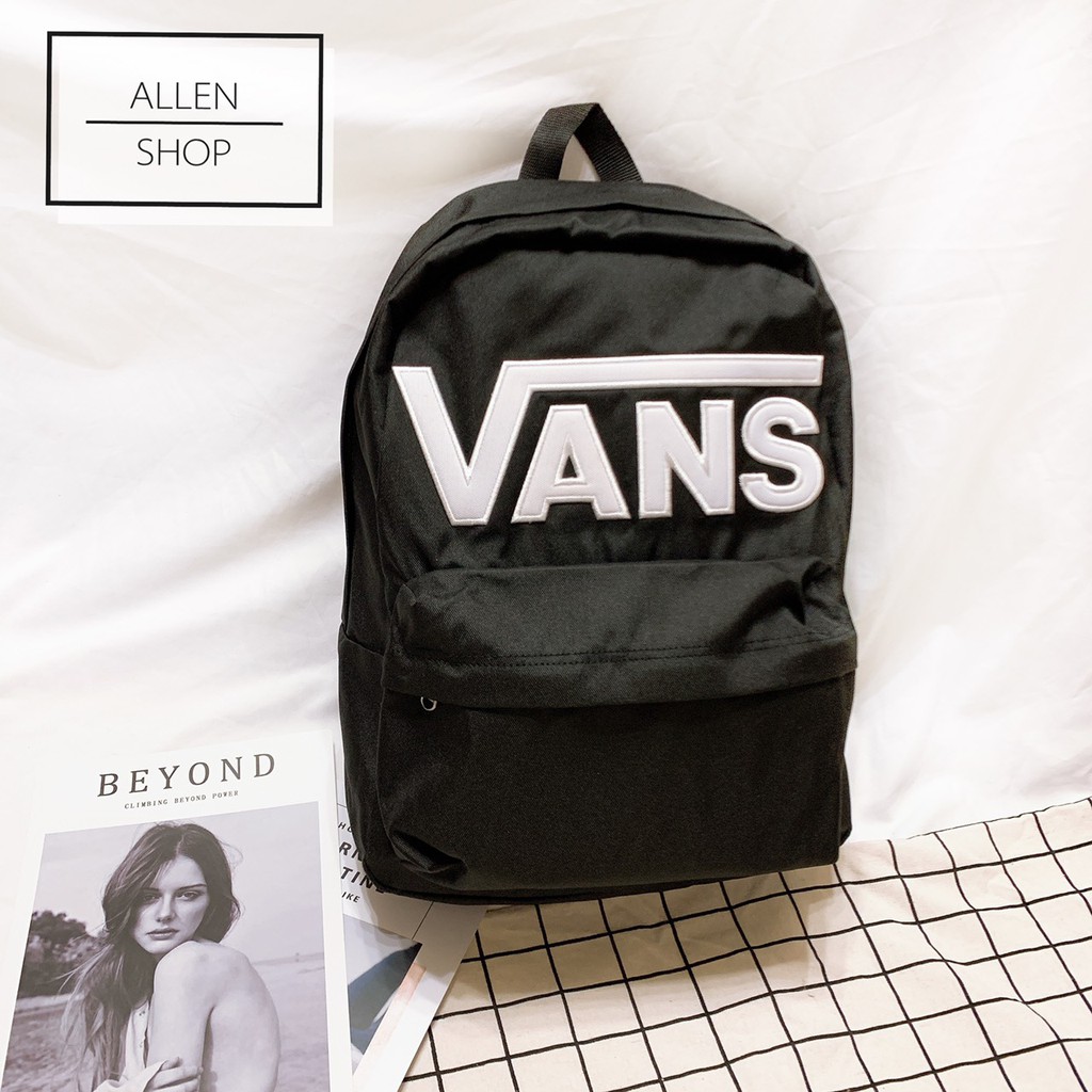 vans black backpack women's