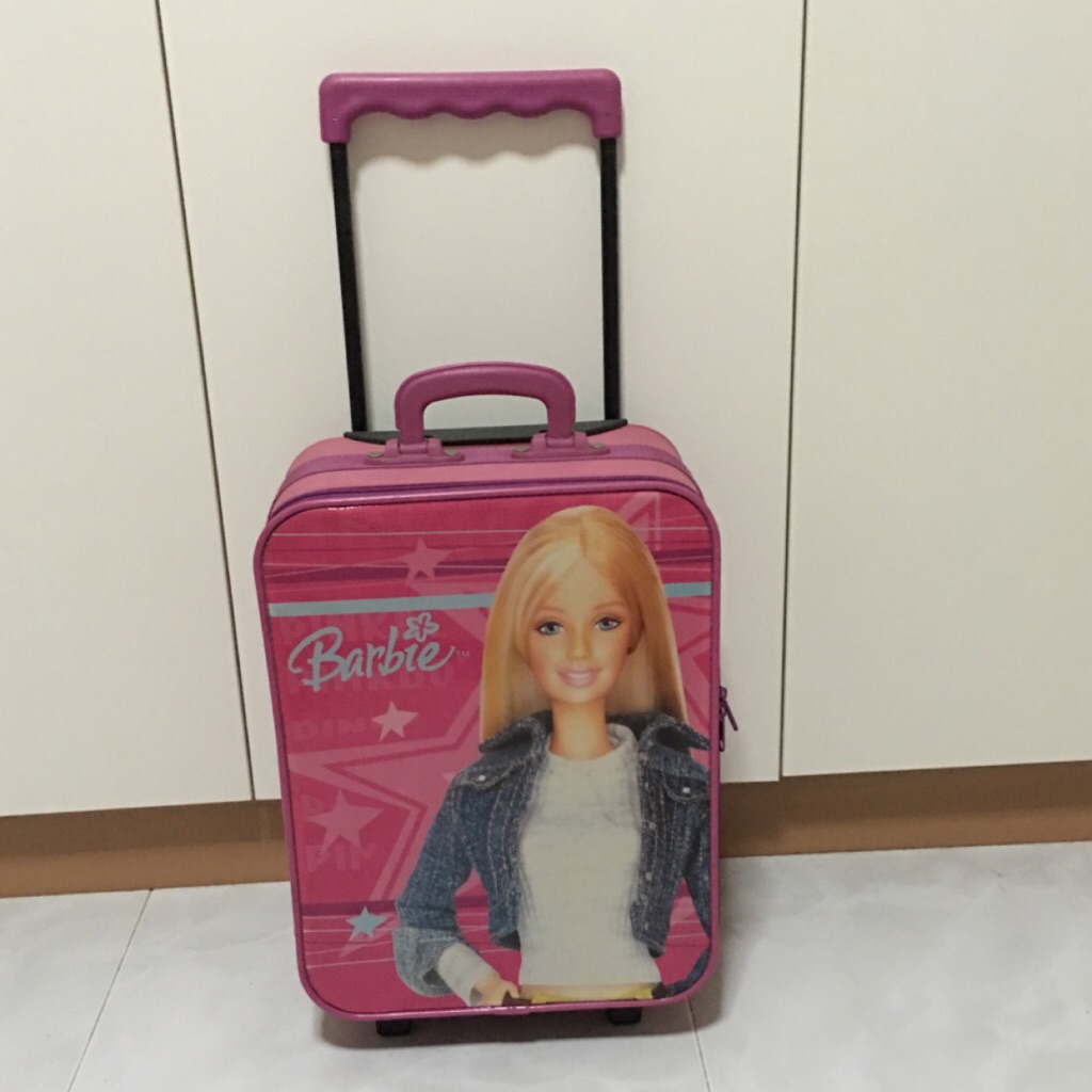 barbie with luggage