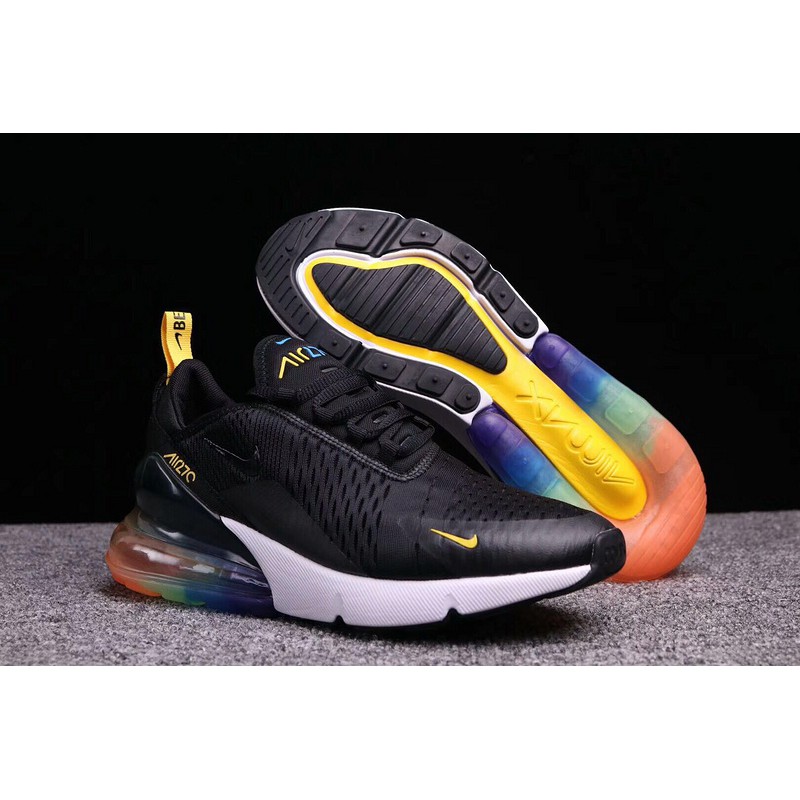 black nike shoes with rainbow colors