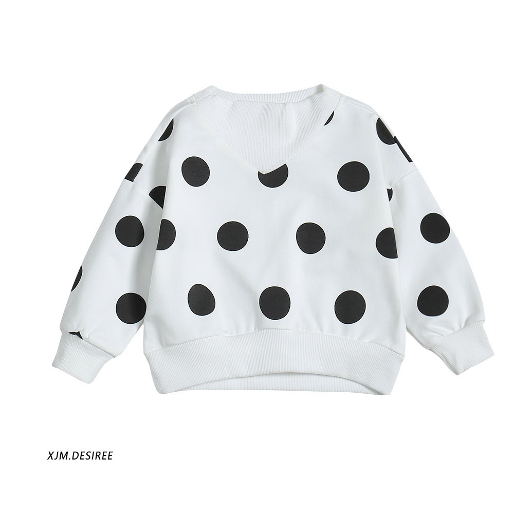 women's white blouse with black polka dots