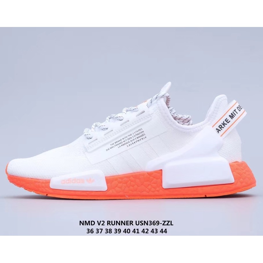 white and orange nmd