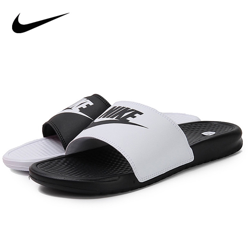 black and white mismatch nike slides