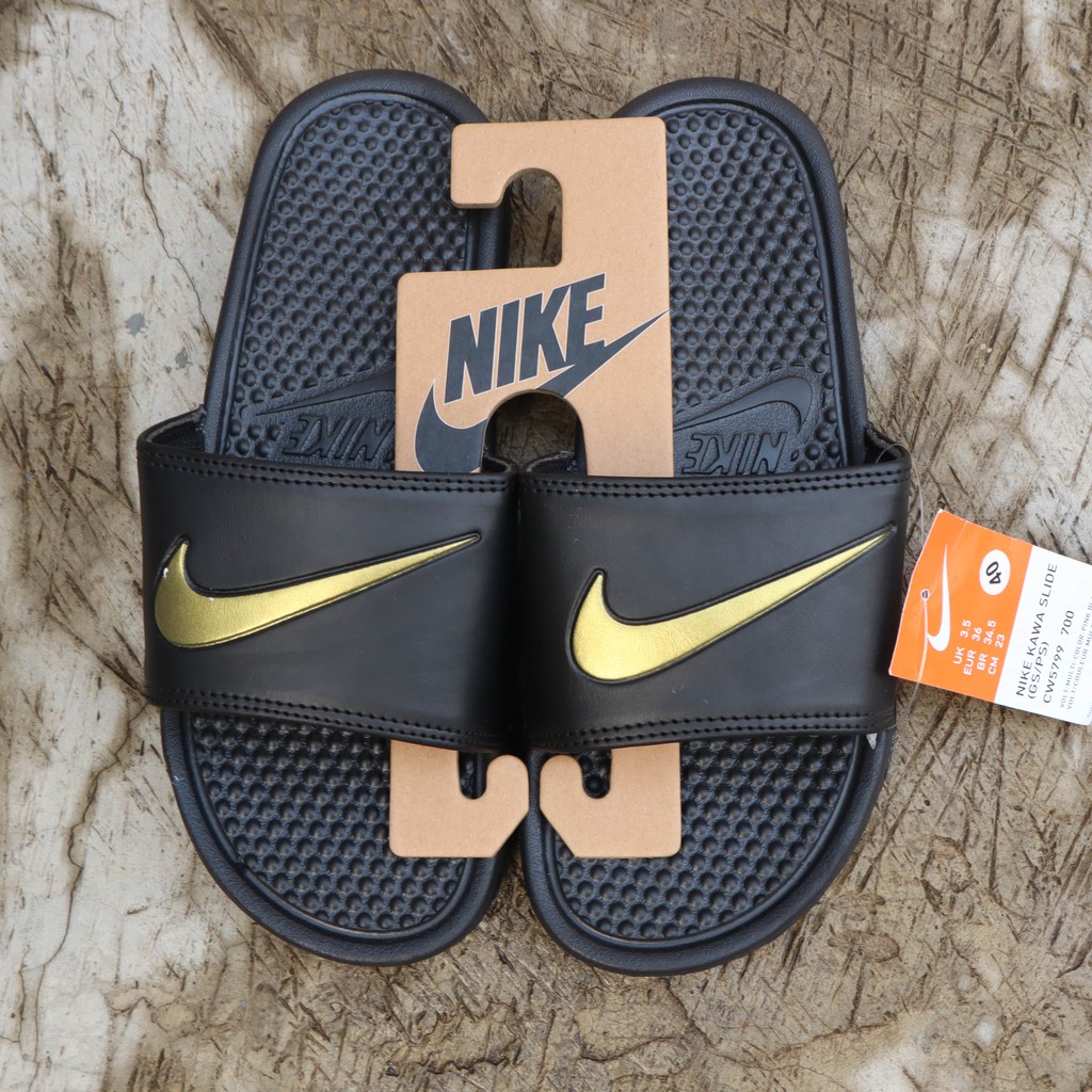 black and gold nike sandals