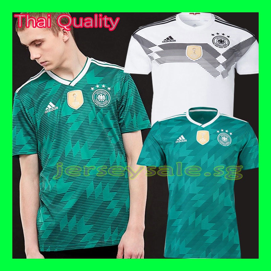 green and white soccer jersey