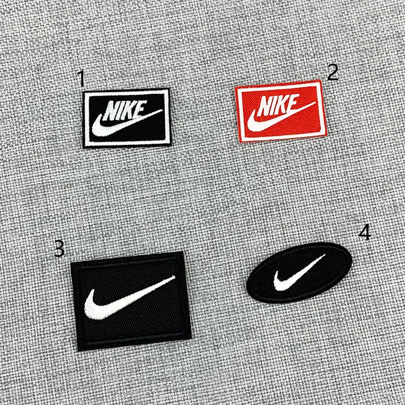 Нашивка найк. Nike эмблема. Нашивка на одежду Nike. Найк лого на одежде.