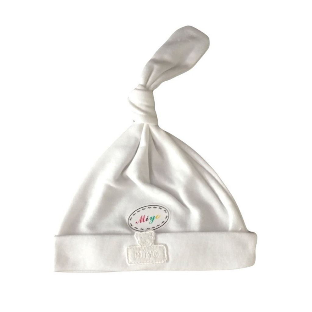 white baby cap