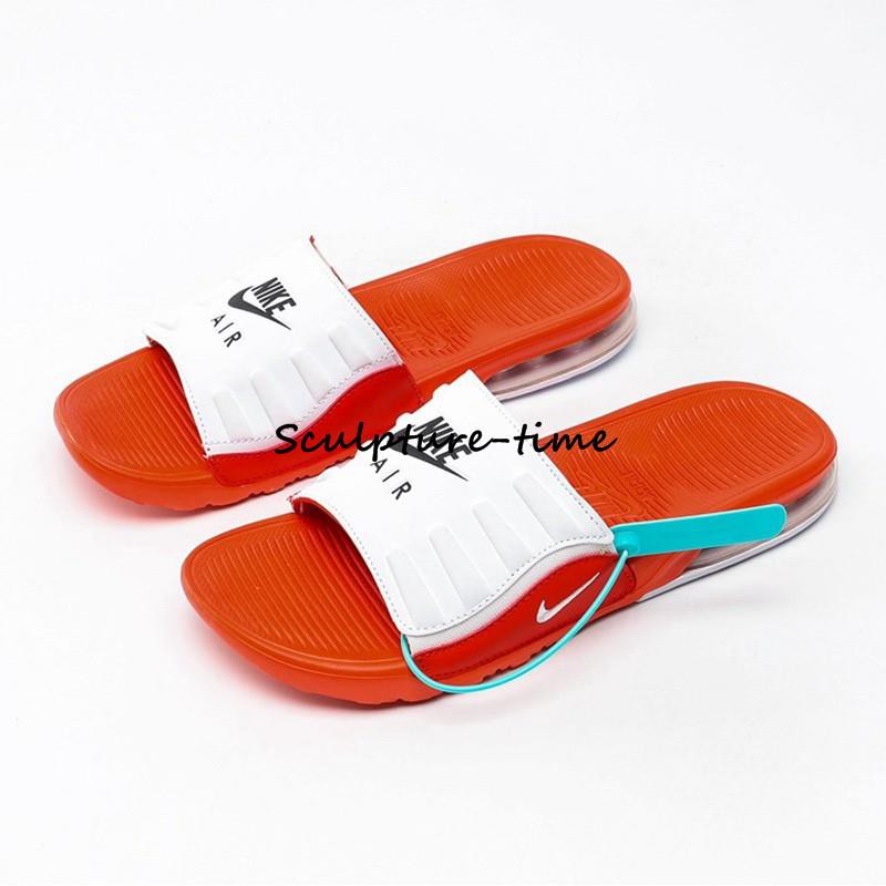 orange nike slippers