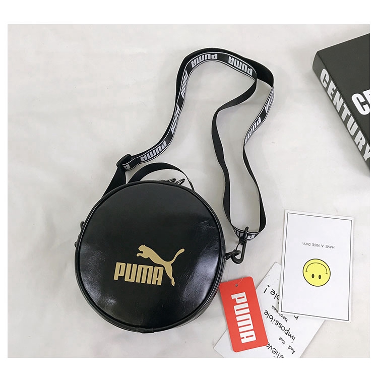 puma round sling bag