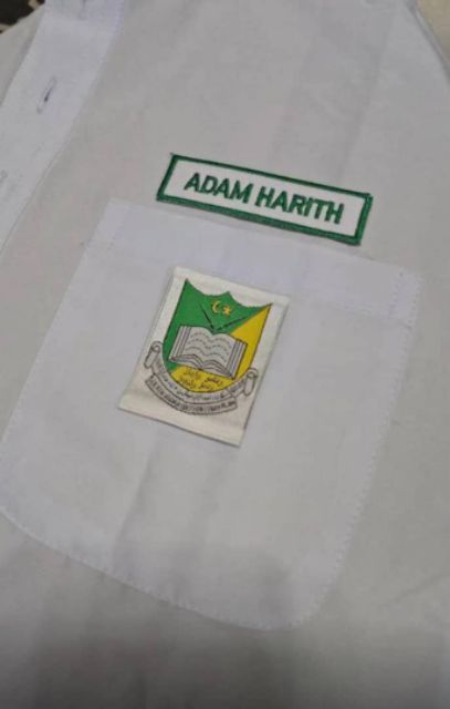 cara jahit lencana sekolah agama