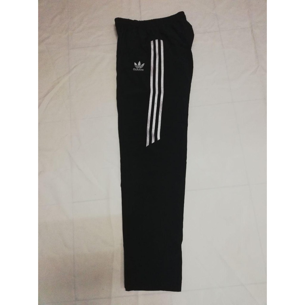 adidas pants with line in the back