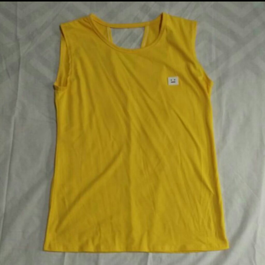 yellow sleeveless top