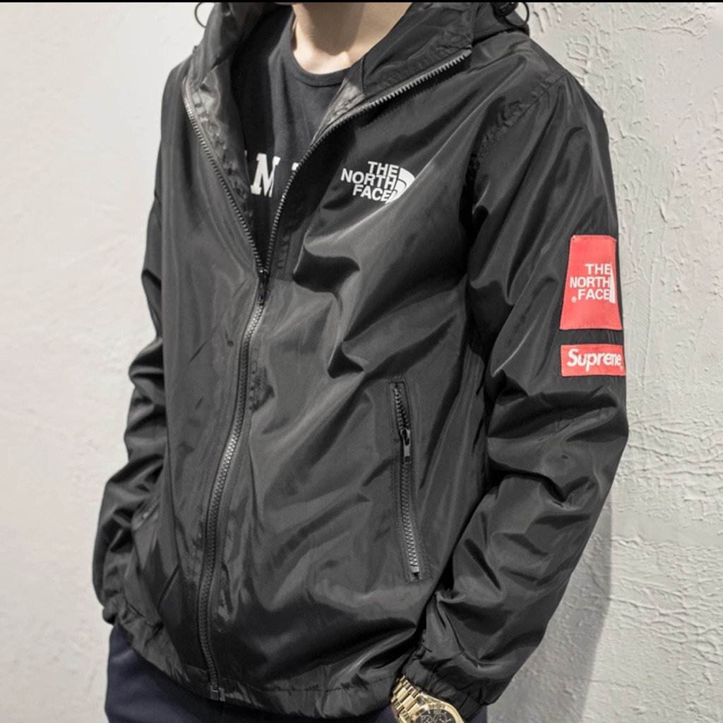 north face x supreme bomber