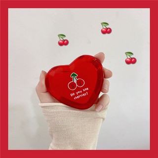 The mirror has two sides, heart-shaped, red, cherry pattern, easy to carry, small size.