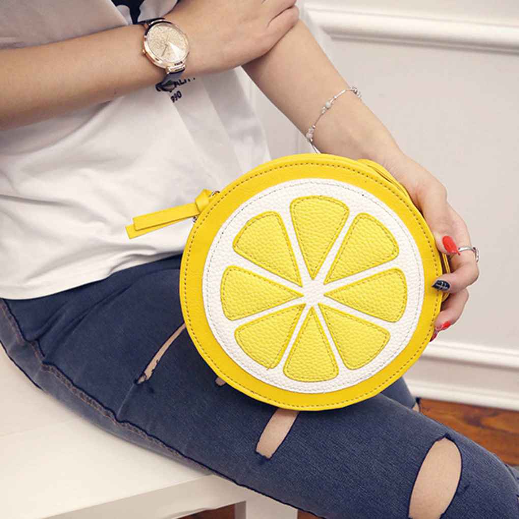 yellow round crossbody bag