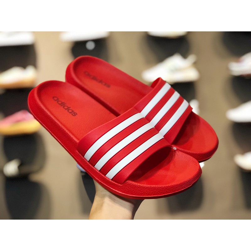 red adidas slippers