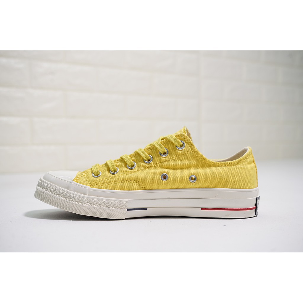 yellow canvas shoes