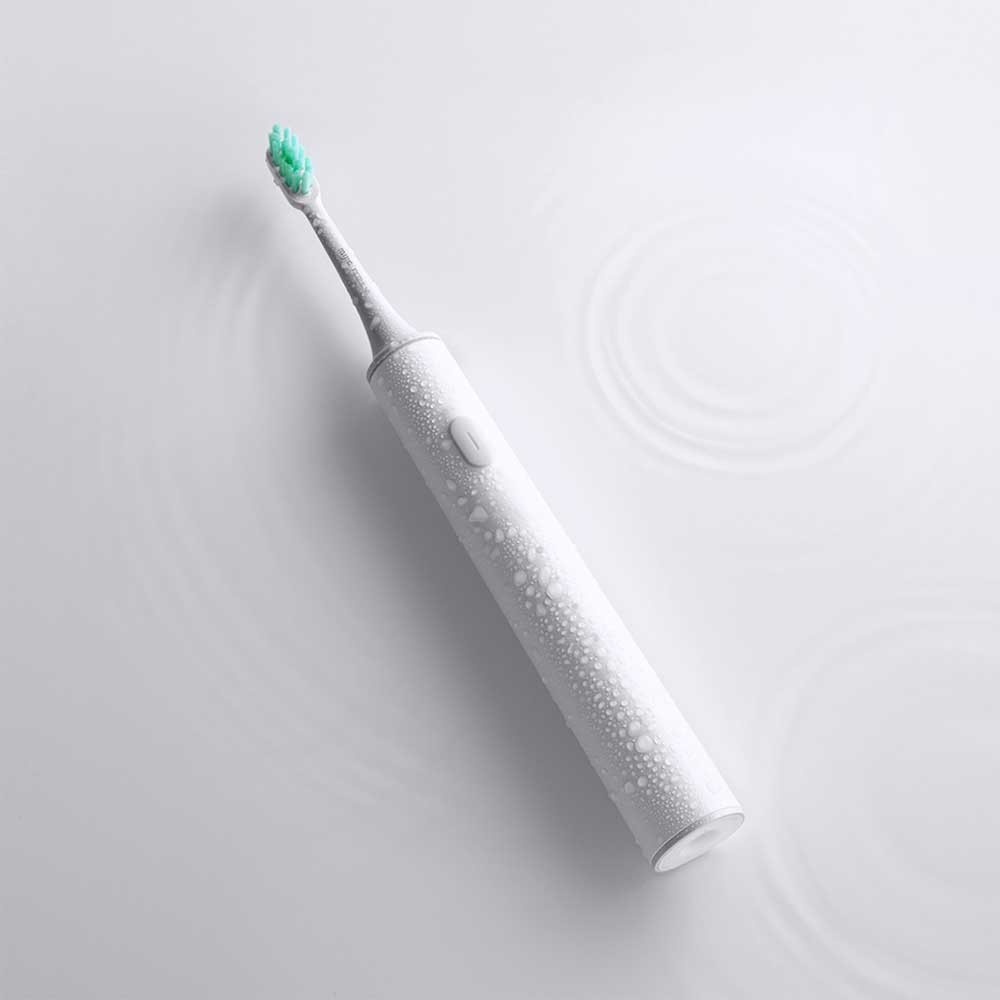 first electric toothbrush