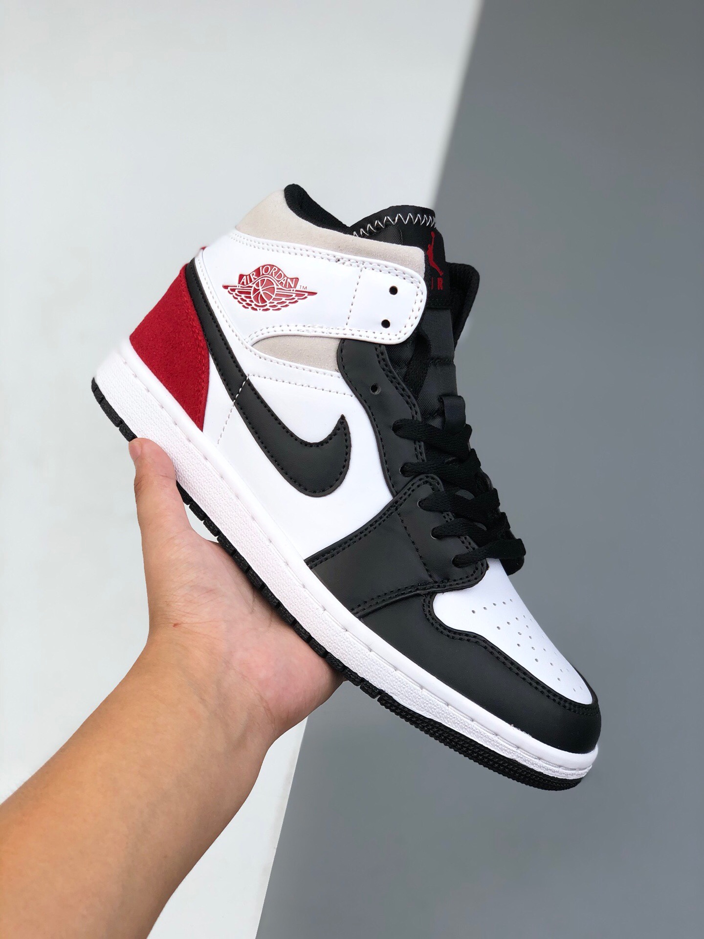 white and red jordan ones