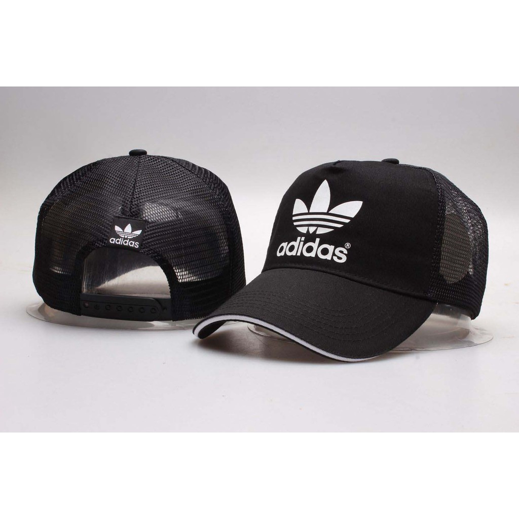 topi golf adidas