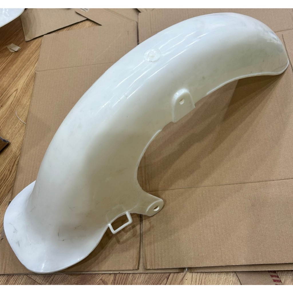 Dè trước chắn bùn trước xe cub 78 nhựa mộc chưa sơn